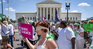 Protesters outside U.S. Supreme Court after abortion ruling (AP Photo/Jacquelyn Martin)