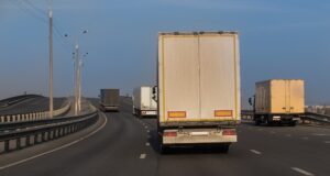 Trucks moving on highway