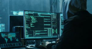 Hacker using computer
