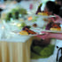 Waitress carrying plates