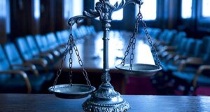 Scales of justice in courtroom