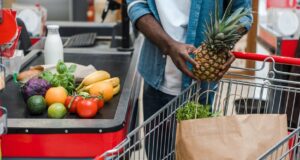 Man in grocery store checkout line