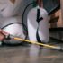 Pest control technician spraying area